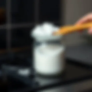 Demonstration of effective baking soda application for stove cleaning.