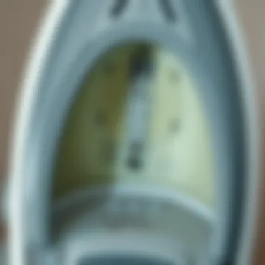 Inside view of a steam iron with limescale buildup