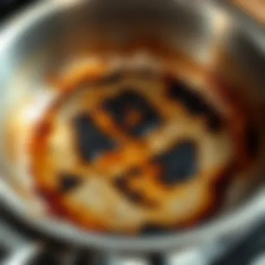 Stainless steel pan with burnt residue
